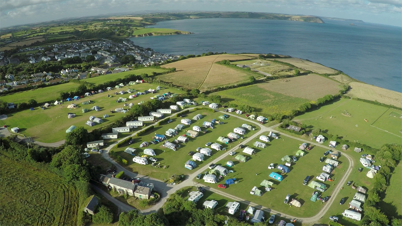 Aerial view of Treloan Campsite beside Gerrans Bay
